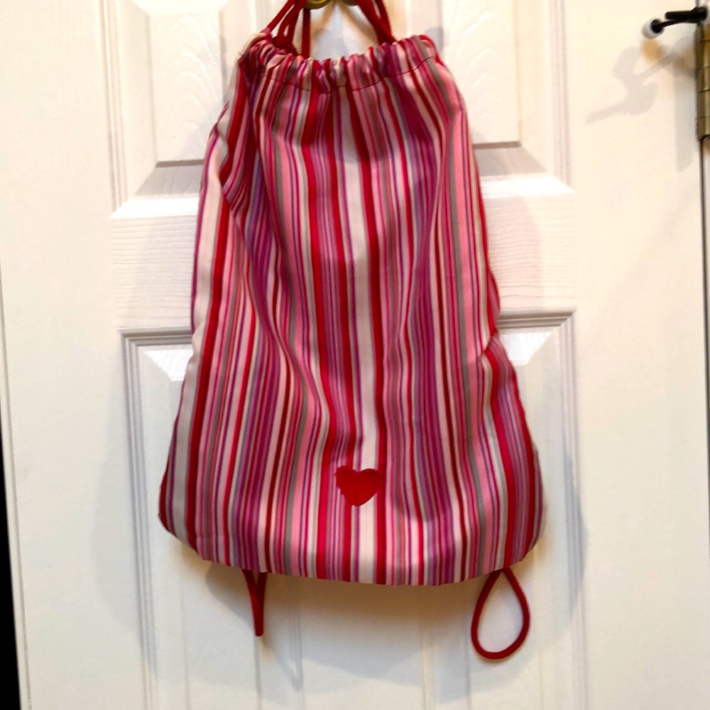 Nike cinch sack bag, excellent condition, barely used. Red, pink, white & gray.